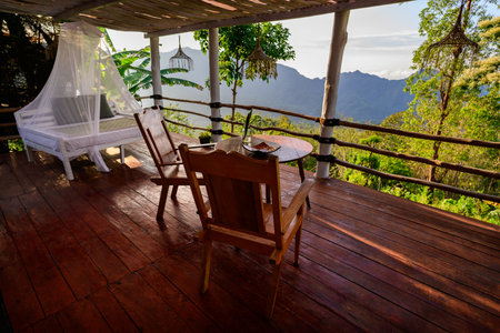 Porch or Verandah overlooking the Lush Jungle Forest in Bajawa, Flores, Indonesiaの写真素材