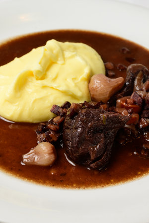 Boeuf Bourguignon French Beef Braised in Burgundy Red Wine with Creamy Mashed Potatoes Vertical...