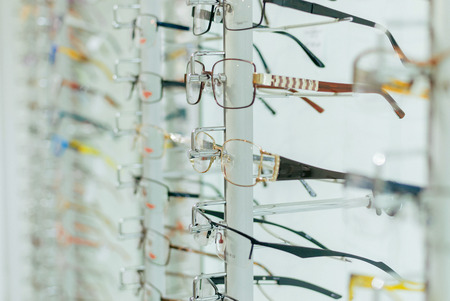 Stand rack with a large selection of glassesの写真素材
