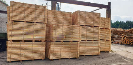 Pallets with wooden planks at the storehouseの写真素材