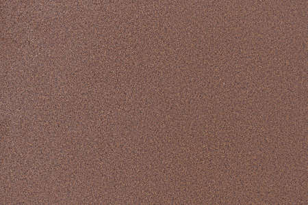 Texture brown plastered wall for background. Brown textured painted wallの写真素材