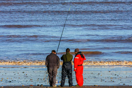 Kingston upon Hull/England - January 9, 2011: Sea fisherman at sunset near Kingston upon Hull in Englandのeditorial素材