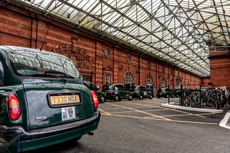 Nottingham/England - September 29, 2010: Taxis waiting for fares at the Nottingham Railway Station...