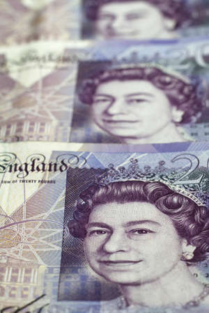 Warsaw, Poland - July 1, 2017: British currency. Close up of British 20 Pound bank notes.のeditorial素材