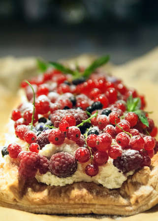 Fresh fruit tart with Raspberries, Redcurrants, Blackcurrants and creamの写真素材