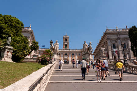Rome, Italy - June 20, 2011: Tourists on Michelangelo stairs to Piazza del Campidoglio on the top of Capitoline Hill and Palazzo Senatorio (Senatorial Palace), Rome, Italy. Capitol Hill - one of the hills of ancient Romeのeditorial素材
