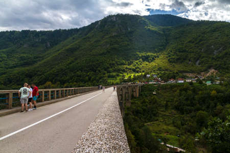 Zabljak/Montenegro - September 2018: People at Tara Bridge. Tara Canyon. "Durdevica Tara Bridge" - concrete Tara Bridge in north Montenegro.のeditorial素材