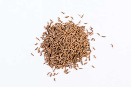 Caraway seeds isolated on white background.