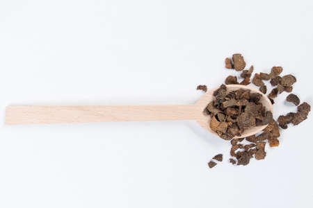 truffless in wooden spoon isolated on white background. Closeup.の写真素材