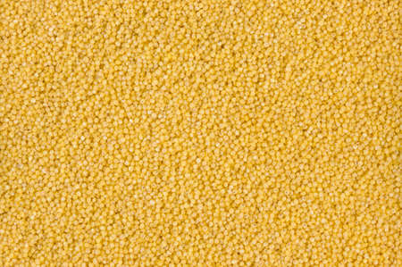 millet groats texture background. nutrition. bio. natural food ingredient.