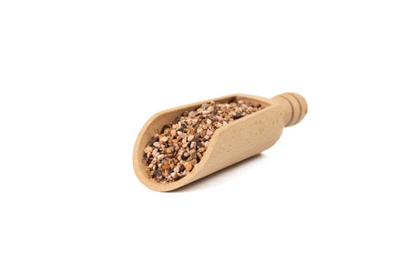 Bistorta officinalis known as bistort, common bistort, European bistort or meadow bistort in wooden scoop isolated on white background. Other common names include snakeroot, snake-root, snakeweed and Easter-ledges. Medicinal coat of arms.の写真素材