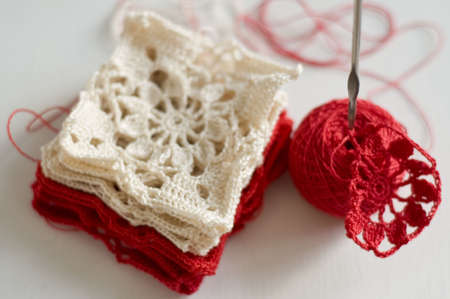 crocheted pattern grandma's square, skeins and the crochetの写真素材