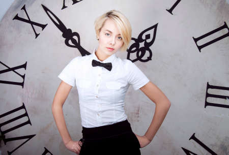 businesswoman near the clock
