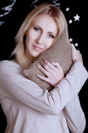 cute blonde girl going to sleepの写真素材