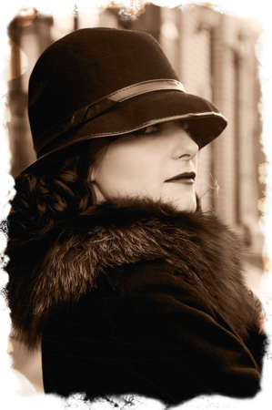 Retro brunette in the hat in the autumn light