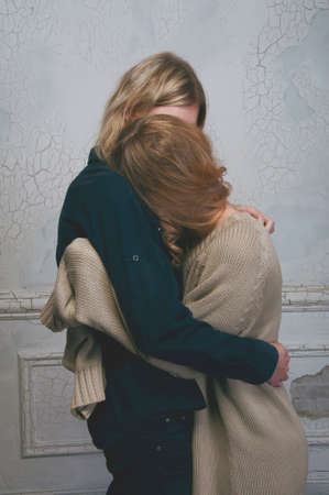 Young couple of lovers hugging goodbuyの写真素材