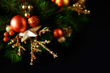 Christmas wreath winter holiday door decoration in golden and orange with artificial berries,...