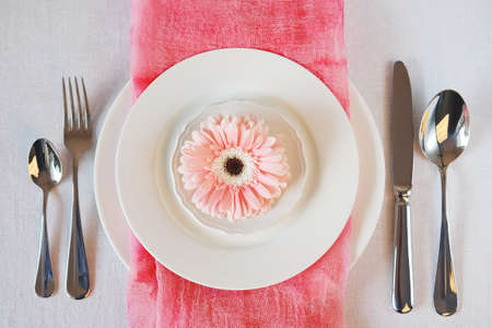 Valentine's Day pink decorated table setting for romantic dinner anniversaryの写真素材