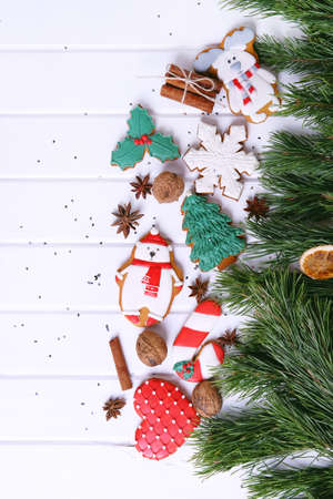 Gingerbread cookies with multicolored frosting decorated for Christmas and New Year holidaysの写真素材