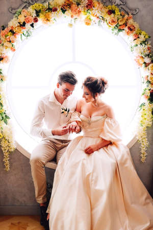 Two young lovers getting engaged in secret.Wedding ceremony concept.の写真素材