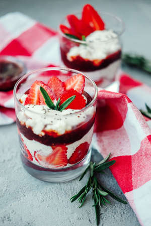 Sweet strawberry summer chia pudding dessert with cream and jellyの写真素材