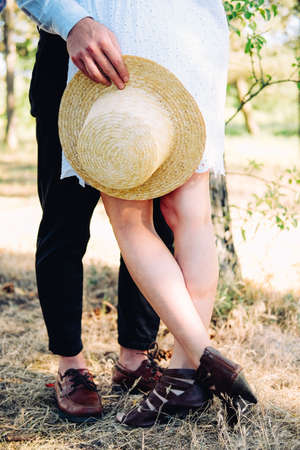Young couple of lovers having a walk outdoors. Dating concept.の写真素材