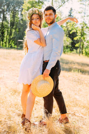 Young couple of lovers having a walk outdoors. Dating concept.の写真素材