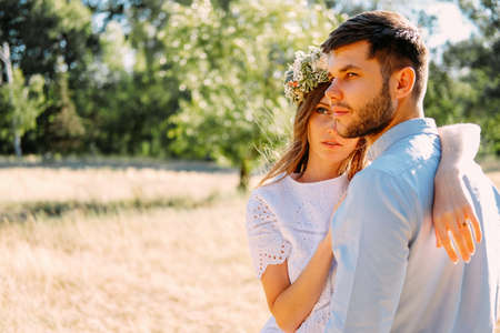 Young couple of lovers having a walk outdoors. Dating concept.の写真素材
