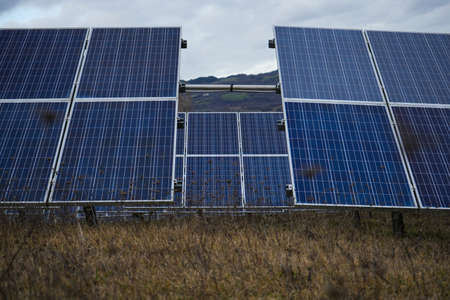 photo of a field of solar panelsの写真素材
