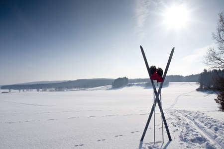cross country ski trail with ski and chopsticksの写真素材