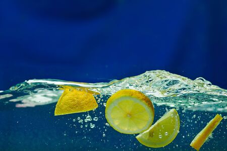 fresh lemon in the waterの写真素材