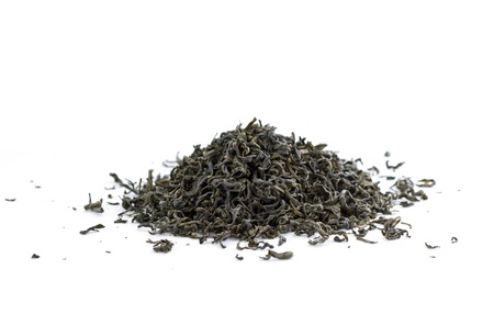dry green tea isolated on whiteの写真素材