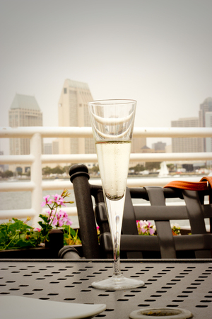 Glass of champagne with a city view - Stock photoの写真素材