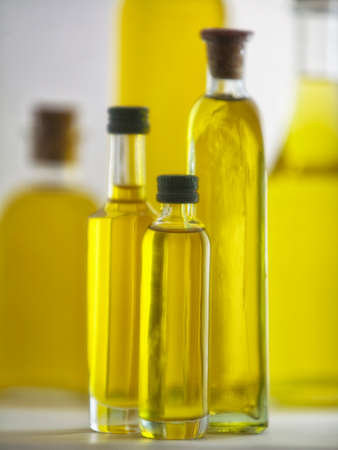 isolated bottle of oil over white backgroundの写真素材