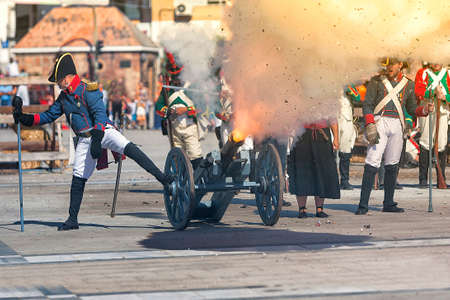 French troops firing cannon on the battlefield during the Representation of the Battle of Bailen,...