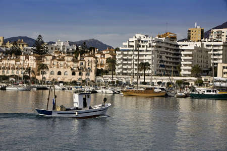 Fishing boat entering the port of Estepona, malaga province, Spainのeditorial素材