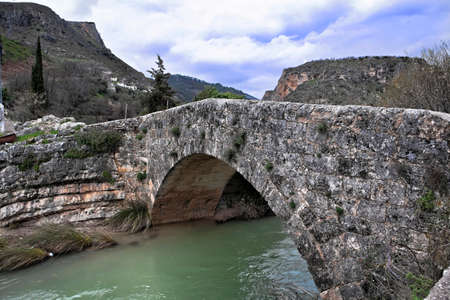 Roman bridge over the passage of Colomera river, Granada, Andalusia, Spainの写真素材