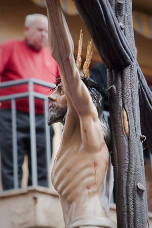 Figure of Jesus on the cross carved in wood by the sculptor Gabino Amaya Guerrero, Holy Christ of the expiry, Linares, Jaen province, Spainのeditorial素材
