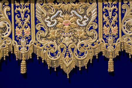 Embroidery thread of gold on blue velvet, Spainの写真素材
