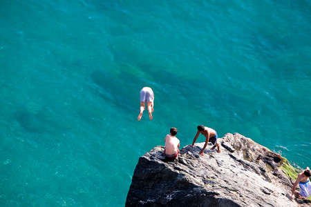 Refreshing images of boys enjoying the sea, Almunecar, Granada province, Spainの写真素材
