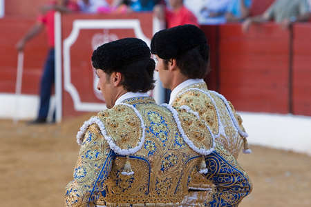Spanish Bullfighters Francisco Rivera and Cayetano Rivera with the Cape in the Bullfight, Villanueva del arzobispo, Jaen province, Spain, 9 september 2011のeditorial素材