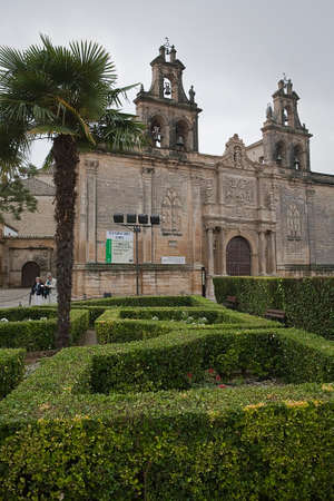 Cloudy day in Church of Santa Maria of the Reales Alcazares from Vazquez de Molina square with...