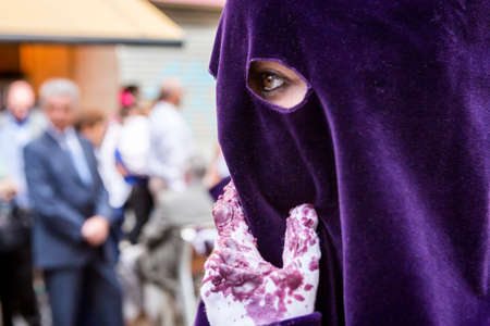 Detail of eye of penitence during a Holy week procession, Spainのeditorial素材