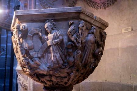 Avila, SPAIN - 10 august 2015: Baptismal Chapel of the cathedral of Avila, inside a space closed by a plateresque grill attributed to Juan Francs, Work of Vasco de la Zarza foot and exedra, 1514, Centuries XIV-XV, Avila, Spainのeditorial素材