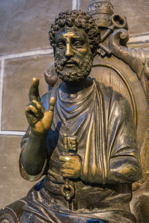 Avila, SPAIN - 10 august 2015: Sculpture in bronze of St. Peter enthroned, is distinguished by...