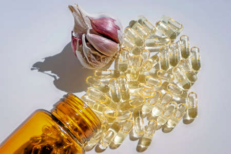 Garlic oil capsules, vitamins d pillsの写真素材