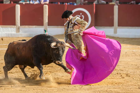 Ubeda, Spain - October 1, 2011: The Spanish Bullfighter El Cid bullfighting with the crutch in the Bullring of Ubeda, Spainのeditorial素材