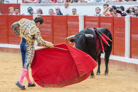 Pozoblanco, Spain - September 23, 2011: The Spanish Bullfighter David Fandila El Fandi bullfighting with the crutch in the Bullring of Pozoblanco, Spainのeditorial素材