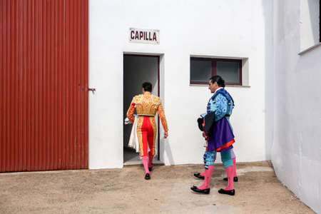 Pozoblanco, Spain - September 23, 2011: The Spanish Bullfighters enter chapel before starting bullfight, tradition ancestral and religion in the world of bullfighting, rite typical Spanish in Bullring of Pozoblanco, Spainのeditorial素材