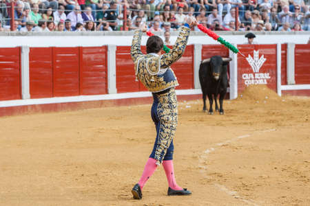 Pozoblanco, Spain - September 23, 2011: The Spanish Bullfighter David Fandila El Fandi with flags in each hand, classic of the taurine art movement in the Bullring of Linares, Spainのeditorial素材